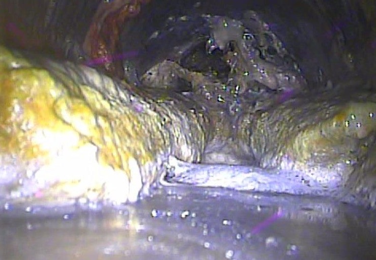 A FOG blocking a sewage pipe